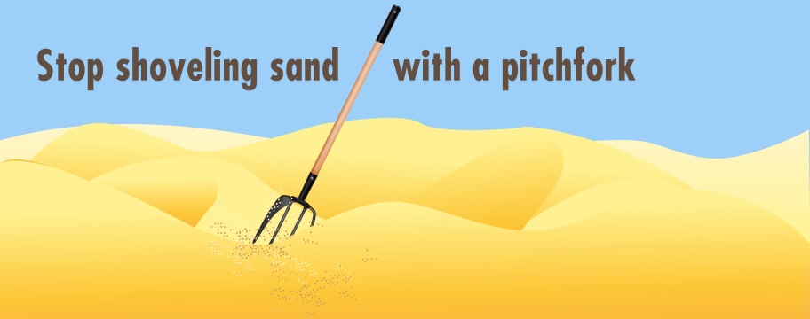 shovelling sand with a pitchfork
